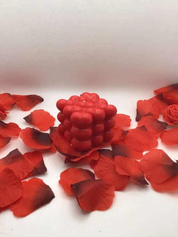 Bougie "coeur ardent" rouge parfum "charme"